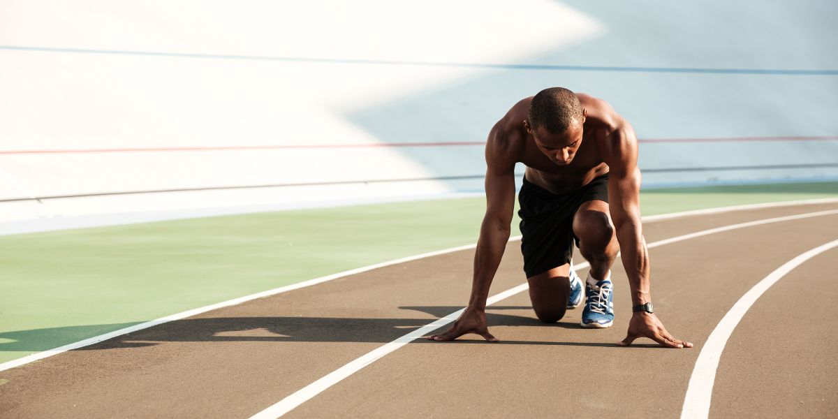 Personne en train de faire de l'exercice physique à l'extérieur, illustrant un mode de vie actif et sain.